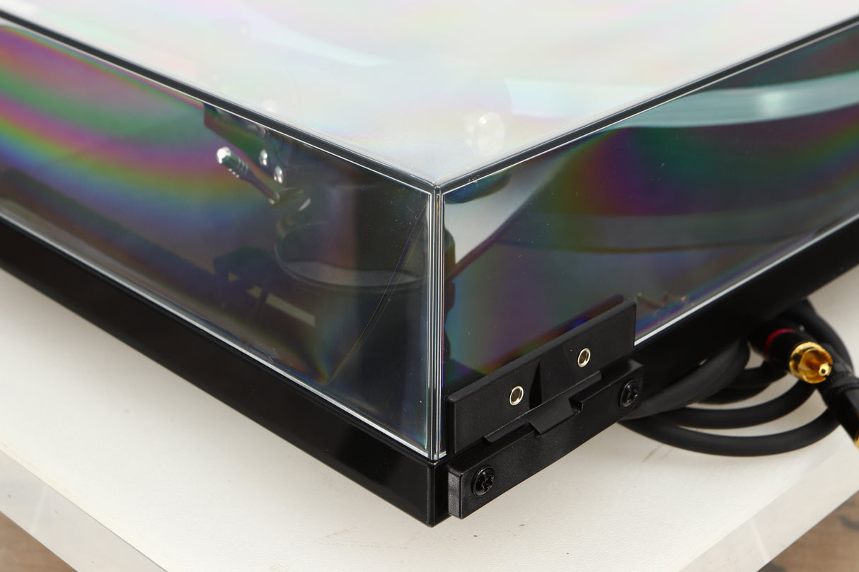 Rear left corner view of a used Rega Planar 3 Turntable with Exact Cartridge in Black Gloss finish