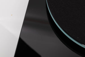 Close up view of a used Rega Planar 3 Turntable in Gloss Black with Elys Cartridge