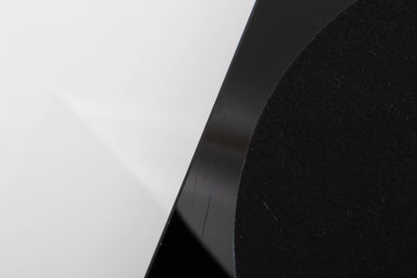 Close up view of a used Rega Planar 3 Turntable in Gloss Black with Elys Cartridge