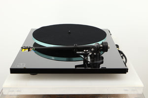Side view of a used Rega Planar 3 Turntable in Gloss Black finish with Exact Cartridge