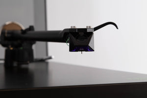 Close up view of a used Rega Planar 3 (24v Upgrade) Turntable in Black with Goldring E3 Cartridge 