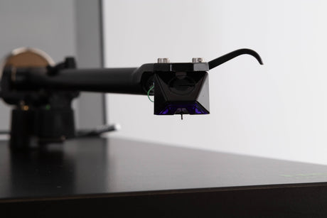 Close up view of a used Rega Planar 3 (24v Upgrade) Turntable in Black with Goldring E3 Cartridge 