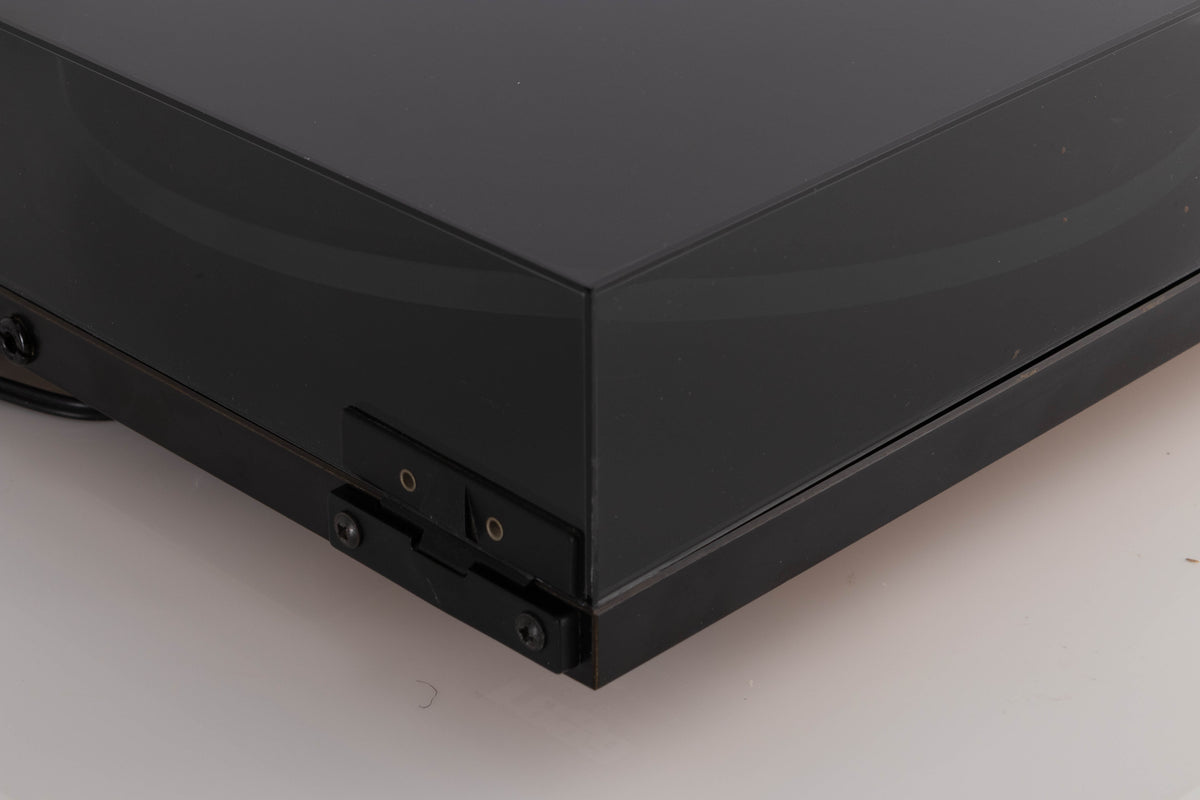 Rear right corner view of a used Rega Planar 3 (24v Upgrade) Turntable in Black with Goldring E3 Cartridge 