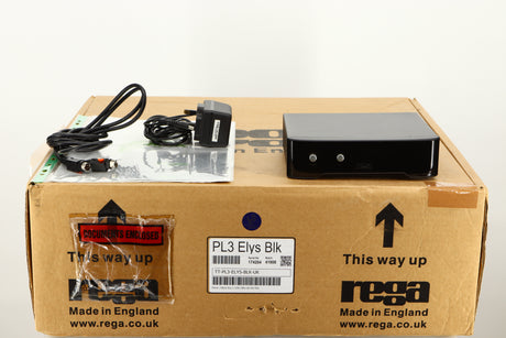 Box for a used Rega Planar 3 Turntable / Ortofon 2M Bronze Cartridge / NEO Power Supply in a black finish showing Manual, PSU, XLR Cable and Cartridge Alignment Protractor