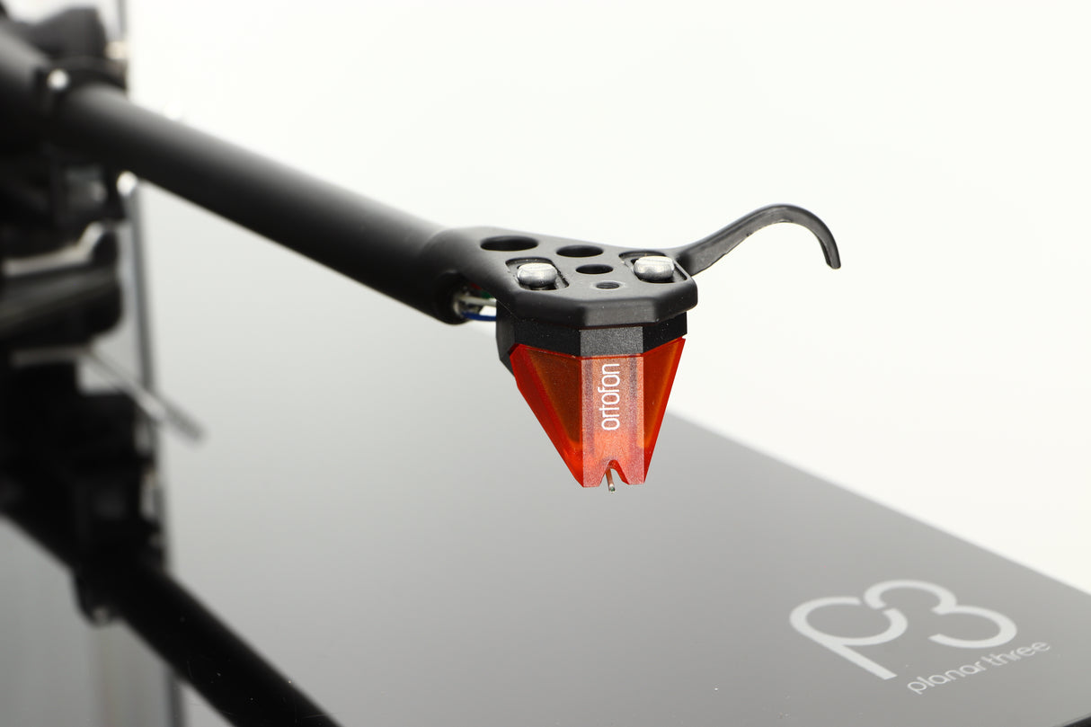 Close up of a used Rega Planar 3 Turntable / Ortofon 2M Bronze Cartridge / NEO Power Supply in a black finish showing stylus