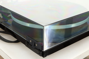 Rear left corner of a used Rega Planar 3 Turntable / Ortofon 2M Bronze Cartridge / NEO Power Supply in a black finish