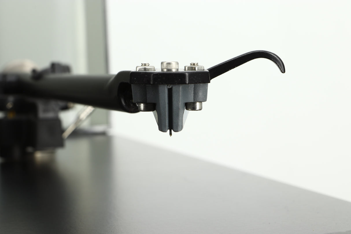 Close up view of a used Rega Planar 3 Turntable cartridge