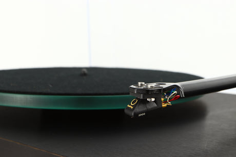 Close up of a used Rega Planar 3 Turntable W/ Goldring 1006 Cartridge in a black finish showing cartridge