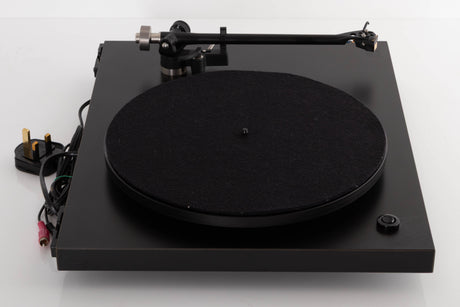Left side view of a used Rega Planar 3 Turntable W/ Nagaoka MP11 Boron Cartridge in a Black finish