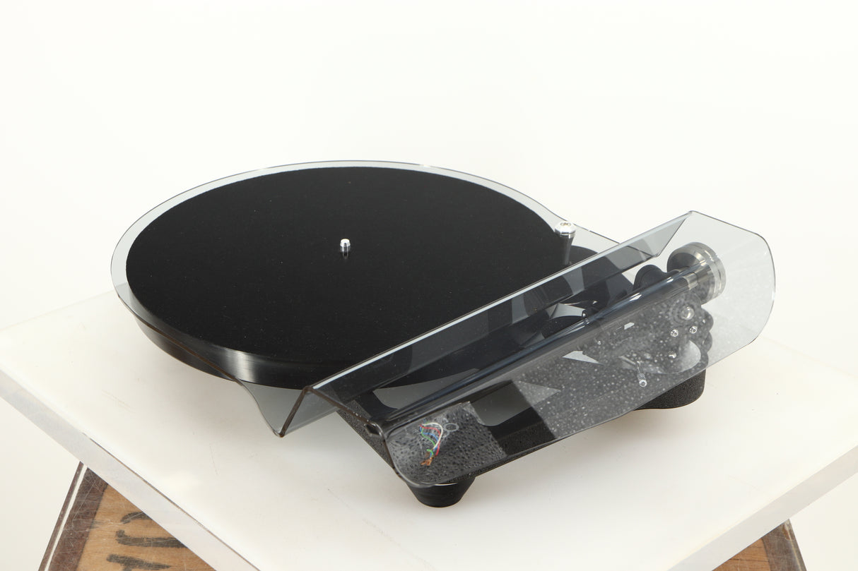 Front right angle of a used Rega Planar 8 Turntable (No Cartridge) in a black finish showing Lid