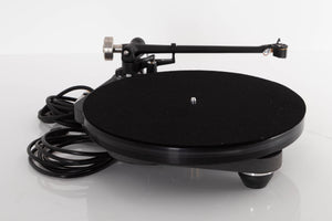 Side view of a used Rega Planar 8 Turntable with Hana ML Cartridge