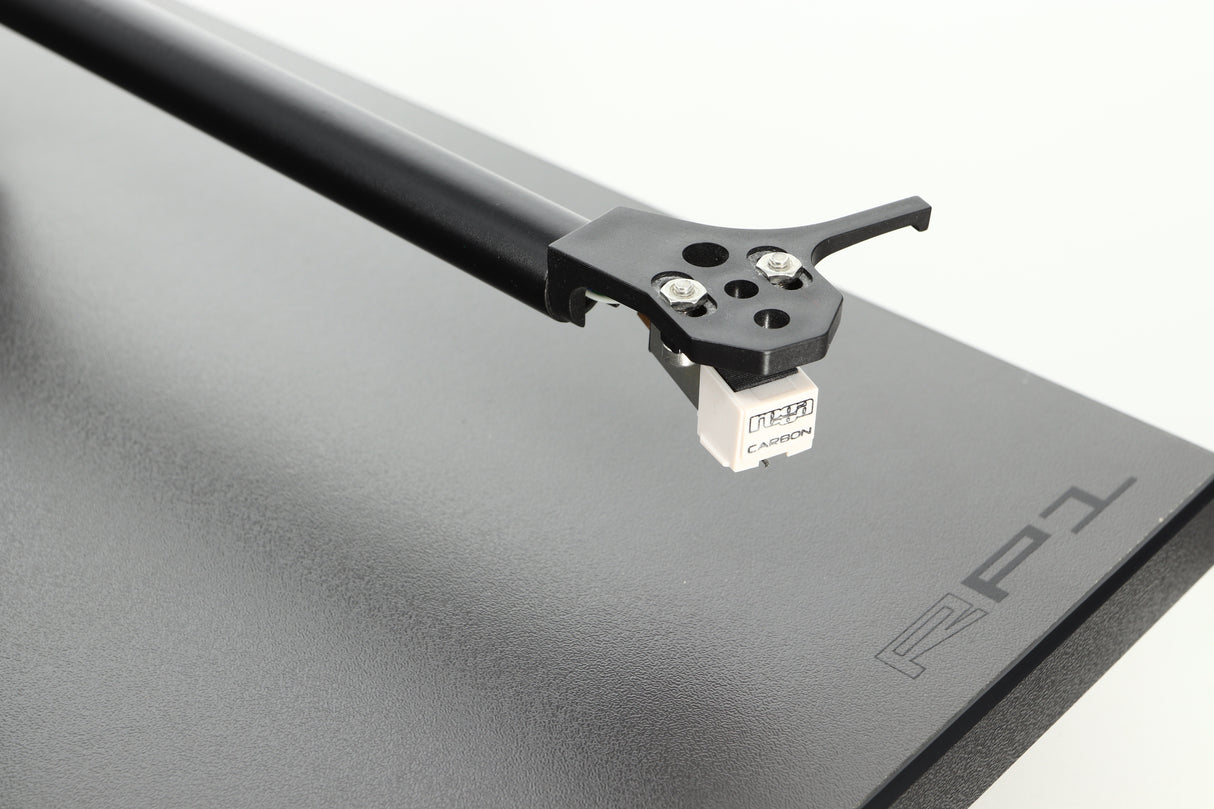 Close up of a used Rega Planar RP1 Turntable in a cool grey finish showing the cartridge