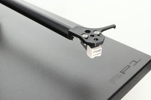 Close up of a used Rega Planar RP1 Turntable in a cool grey finish showing the cartridge
