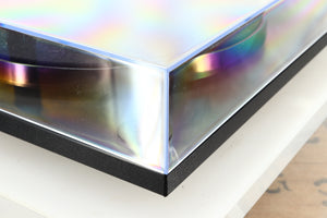 Front left corner of a used Rega Planar RP1 Turntable in a cool grey finish