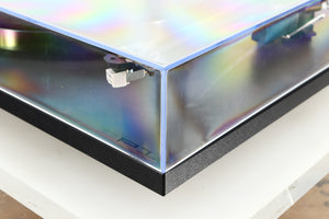 Front right corner of a used Rega Planar RP1 Turntable in a cool grey finish