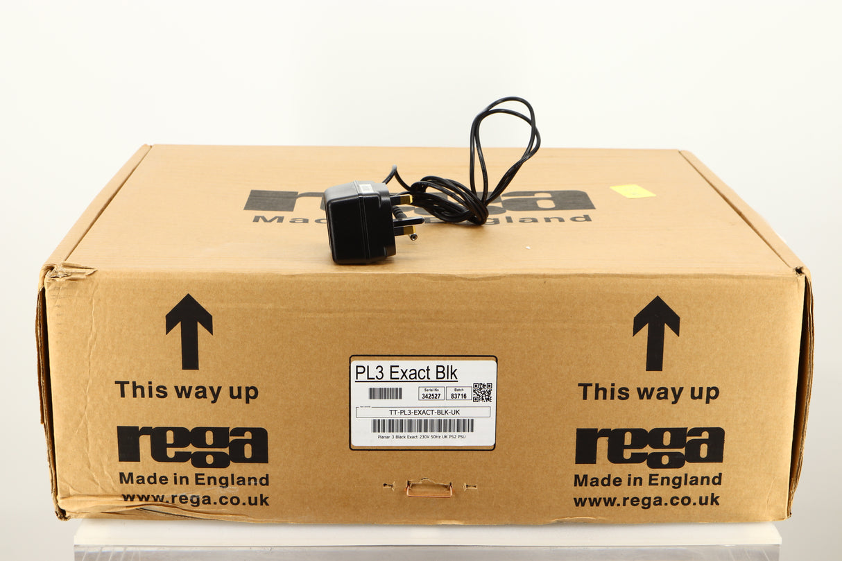 Box for a used Rega Planar 3 Turntable / Exact Cartridge in a black finish showing PSU