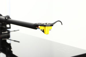 Close up of a used Rega Planar 3 Turntable / Exact Cartridge in a black finish showing stylus