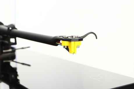 Close up of a used Rega Planar 3 Turntable / Exact Cartridge in a black finish showing stylus