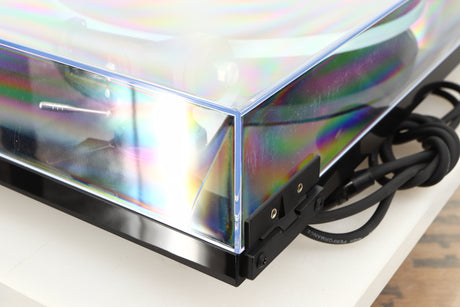Rear right corner of a used Rega Planar 3 Turntable / Exact Cartridge in a black finish