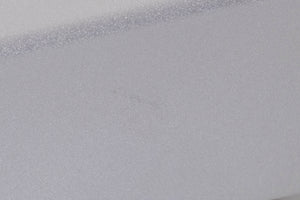 Close up of a used Rega Planet CD Player in a Silver finish showing light mark on right side
