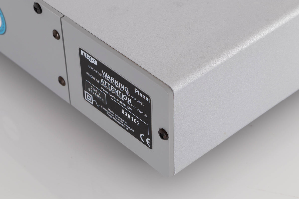Rear left corner of a used Rega Planet CD Player in a Silver finish