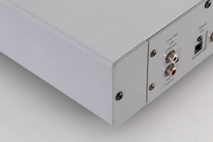 Rear right corner of a used Rega Planet CD Player in a Silver finish