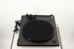 Left side view of a used Rega RP1 Turntable in a cool grey finish