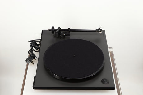 Left side view of a used Rega RP1 Turntable in a cool grey finish