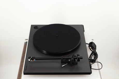 Right side view of a used Rega RP1 Turntable in a cool grey finish