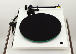 Left side view of a used Rega RP3 / Exact Cartridge in a white finish