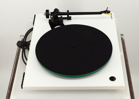 Left side view of a used Rega RP3 / Exact Cartridge in a white finish