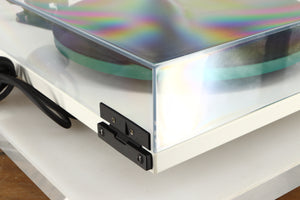 Rear left corner of a used Rega RP3 / Exact Cartridge in a white finish