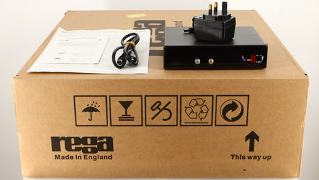 Box for a used Rega RP40 Anniversary Edition Turntable / Exact Cartridge in a titanium finish showing Manual, DIN Cable, PSU and TTPSU
