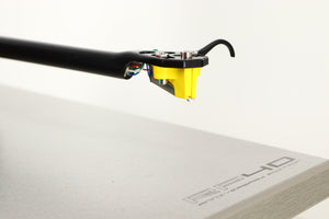 Close up of a used Rega RP40 Anniversary Edition Turntable / Exact Cartridge in a titanium finish showing stylus