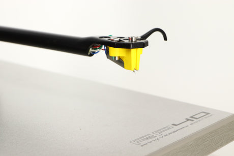 Close up of a used Rega RP40 Anniversary Edition Turntable / Exact Cartridge in a titanium finish showing stylus