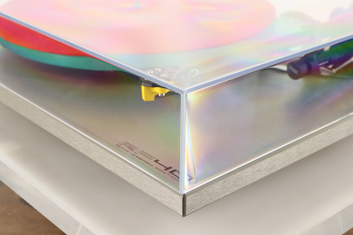 Front right corner of a used Rega RP40 Anniversary Edition Turntable / Exact Cartridge in a titanium finish