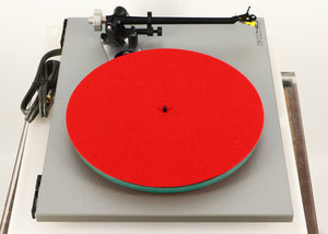 Left side view of a used Rega RP40 Anniversary Edition Turntable / Exact Cartridge in a titanium finish