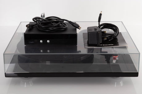 Front view of a used Rega RP6 Turntable in Black with Dynavector DV-10 X5 Cartridge, TTPSU, Mains Cable, and PSU Cable