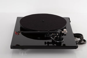 Side view of a used Rega RP6 Turntable in Black with Dynavector DV-10 X5 Cartridge