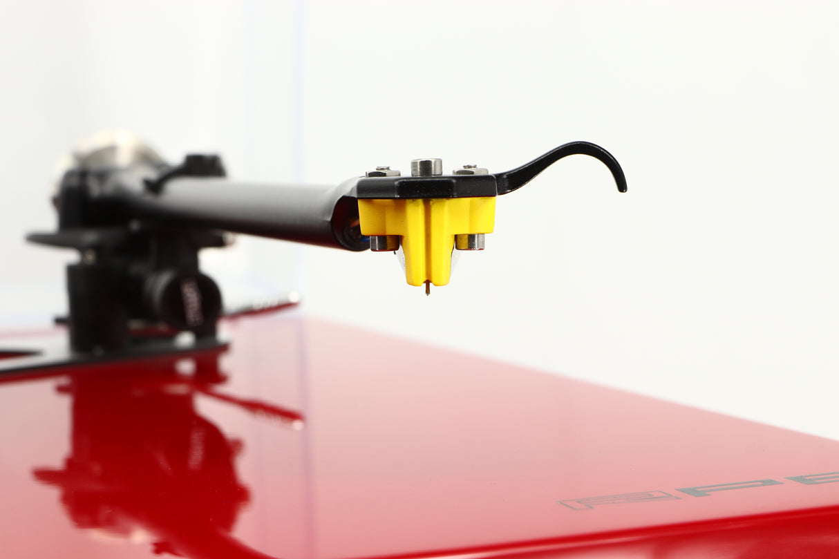 Close up view of a used Rega RP6 Turntable in Red finish with Exact Cartridge