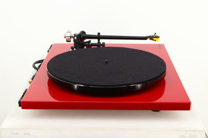 Side view of a used Rega RP6 Turntable in Red finish with Exact Cartridge