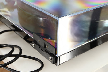 Rear left corner of a used Rega RP8 Turntable / Apheta 2 MC Cartridge in a black finish