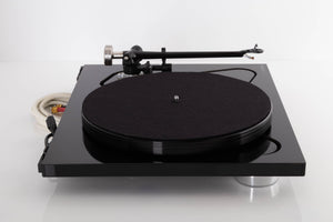 Side view of a used Rega RP8 Turntable in Gloss Black finish