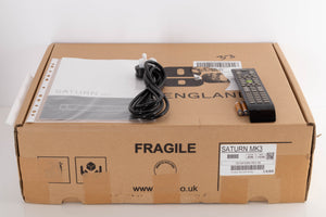 Box for a used Rega Saturn MK3 CD Player in a Black finish showing Manual, Mains Cable, Remote and Batteries