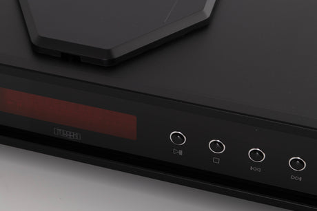 Close up of a used Rega Saturn MK3 CD Player in a Black finish showing scratching on screen