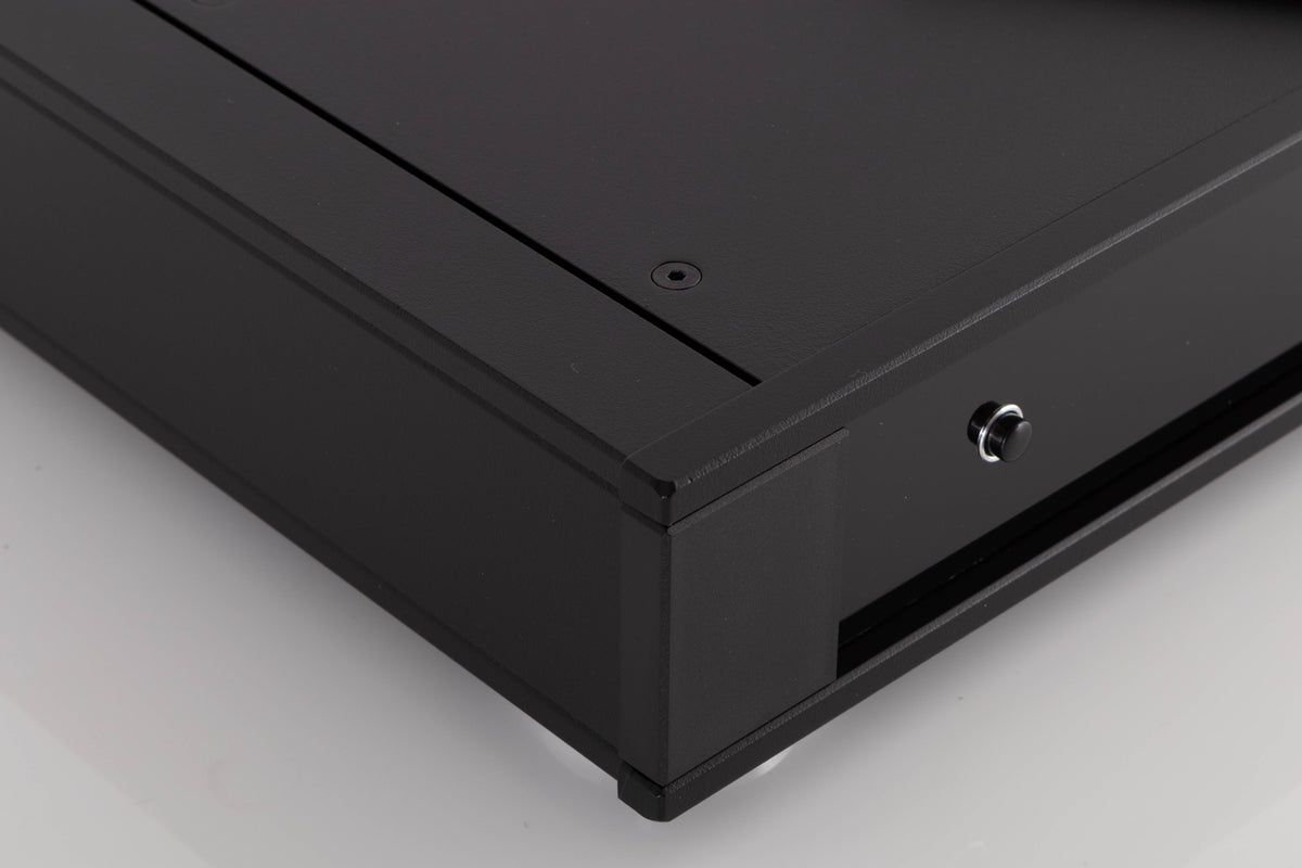Front left corner of a used Rega Saturn MK3 CD Player in a Black finish