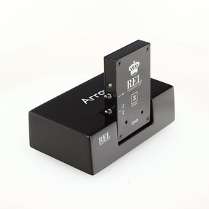 Front left corner of a used REL Arrow V3 Wireless Subwoofer Transmitter in a black finish