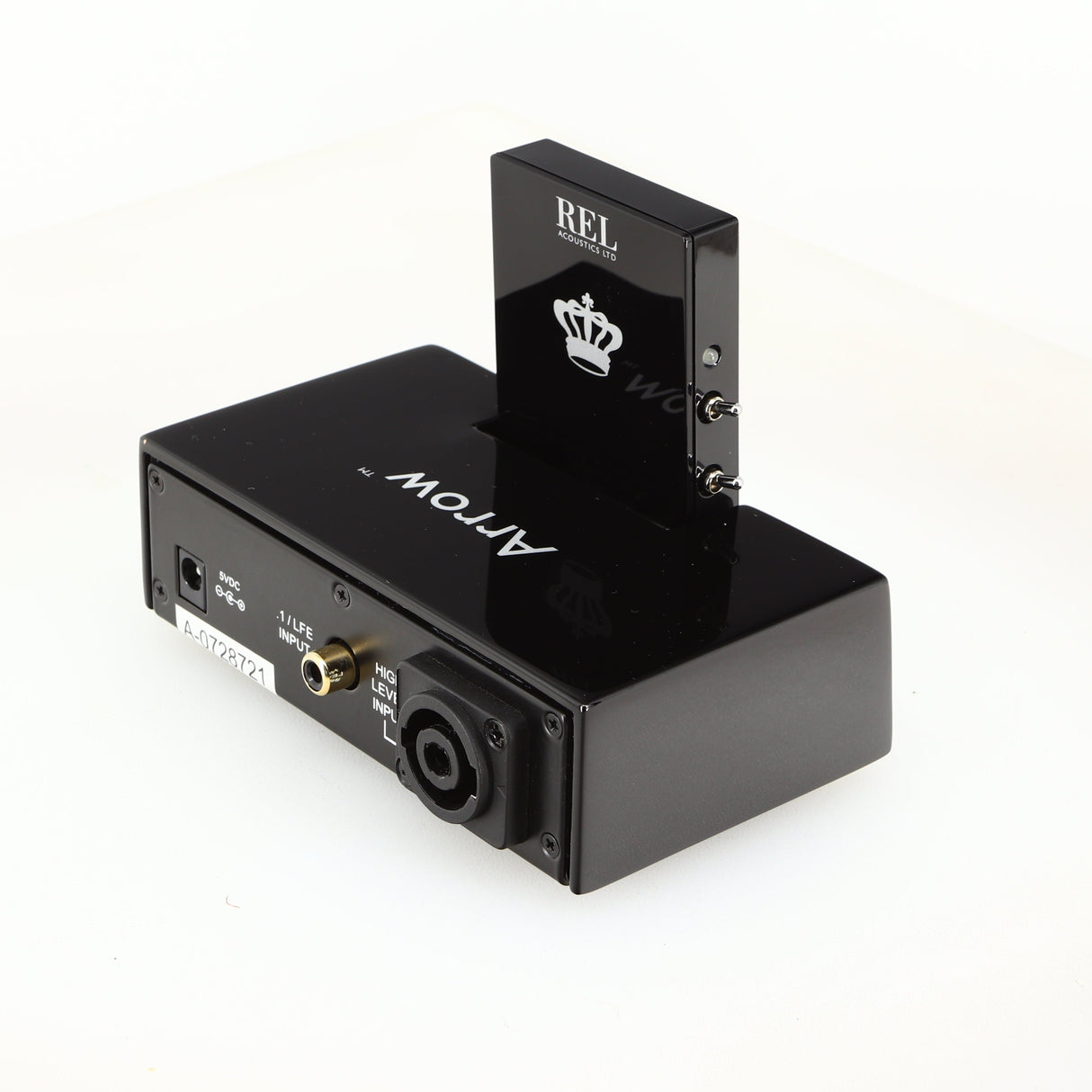 Rear left corner of a used REL Arrow V3 Wireless Subwoofer Transmitter in a black finish
