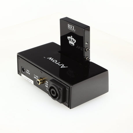 Rear left corner of a used REL Arrow V3 Wireless Subwoofer Transmitter in a black finish