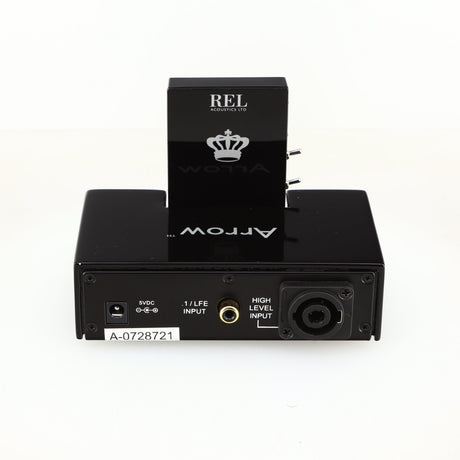 Rear view of a used REL Arrow V3 Wireless Subwoofer Transmitter in a black finish showing Phono Input, Power Input and Hi-Level Input